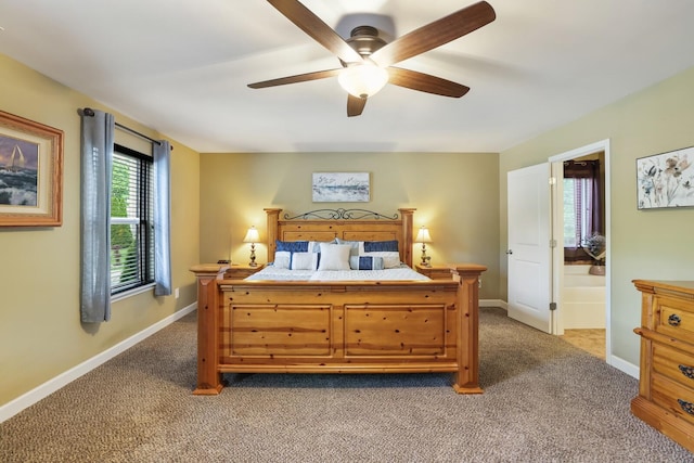 bedroom with carpet floors, baseboards, and ceiling fan