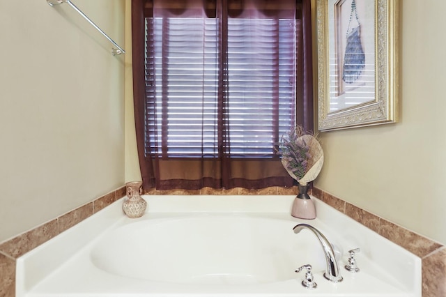 bathroom featuring a garden tub