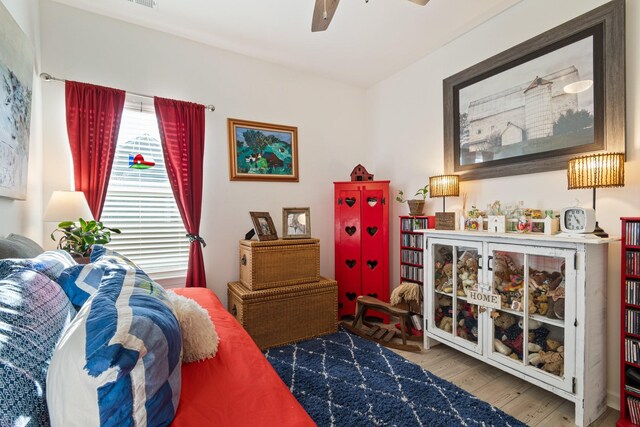 bedroom featuring wood finished floors
