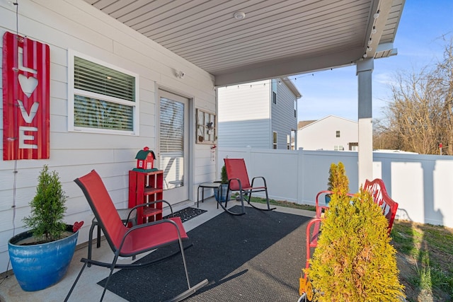 view of patio with fence