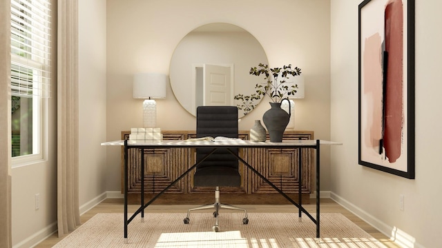 office featuring wood finished floors and baseboards