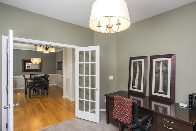 1552 Liberty Pike, Franklin, TN 37067 - office area with a chandelier, light wood-style flooring, and a wainscoted wall