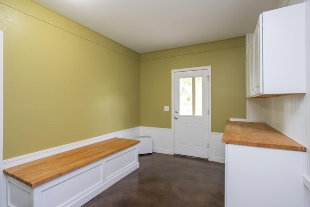 1552 Liberty Pike, Franklin, TN 37067 - mudroom featuring a wainscoted wall and finished concrete floors