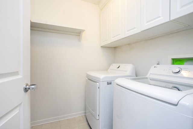 1552 Liberty Pike, Franklin, TN 37067 - washroom with washing machine and dryer, cabinet space, and baseboards
