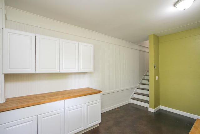 1552 Liberty Pike, Franklin, TN 37067 - below grade area featuring baseboards and stairs