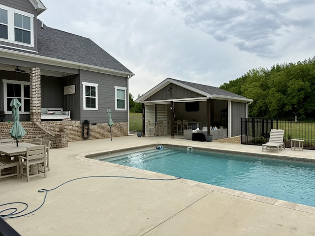 69 Meadows Rd, Hillsboro, TN 37342 - view of swimming pool featuring a patio, exterior kitchen, and fence