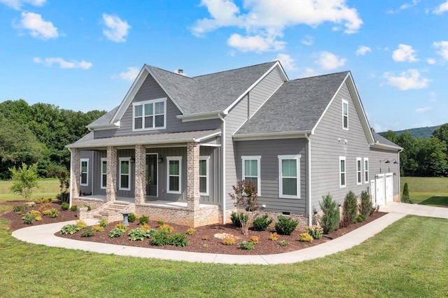69 Meadows Rd, Hillsboro, TN 37342 - view of front of house with a porch, a front yard, roof with shingles, a garage, and driveway