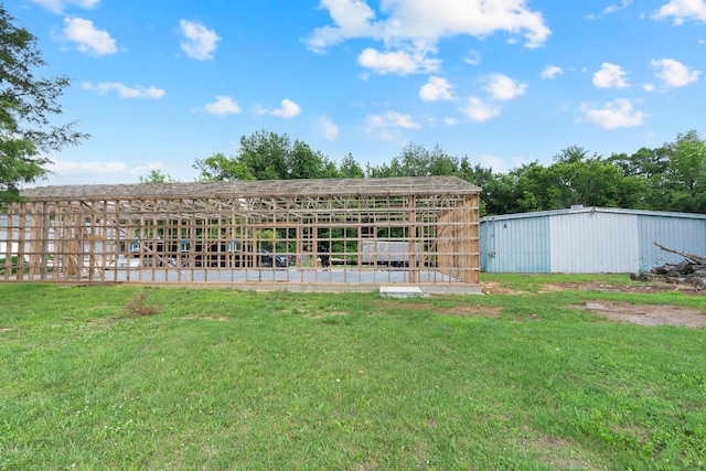 69 Meadows Rd, Hillsboro, TN 37342 - view of grassy yard featuring an outbuilding