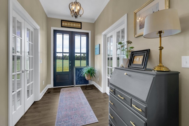 69 Meadows Rd, Hillsboro, TN 37342 - foyer entrance featuring french doors, a chandelier, dark wood-style flooring, and ornamental molding
