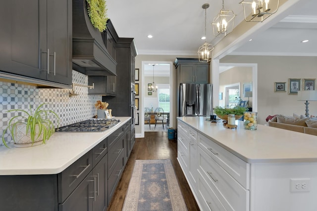 69 Meadows Rd, Hillsboro, TN 37342 - kitchen featuring stainless steel appliances, a chandelier, custom range hood, dark wood finished floors, and ornamental molding