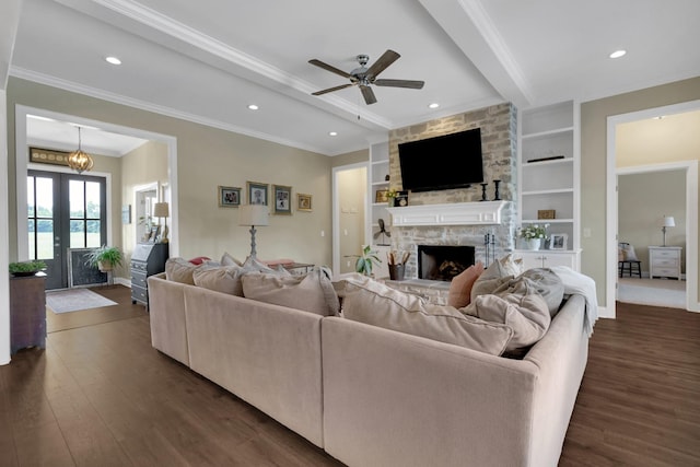 69 Meadows Rd, Hillsboro, TN 37342 - living room with dark wood-type flooring, a stone fireplace, a ceiling fan, beamed ceiling, and recessed lighting
