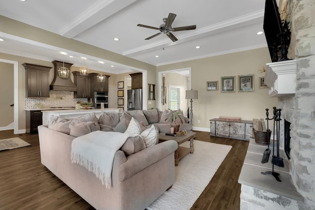 69 Meadows Rd, Hillsboro, TN 37342 - living room with dark wood finished floors, ceiling fan, beamed ceiling, a fireplace, and recessed lighting