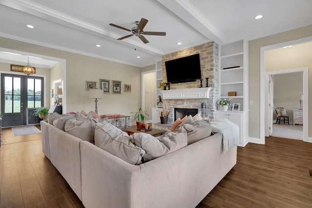 69 Meadows Rd, Hillsboro, TN 37342 - living room with dark wood-style flooring, a fireplace, crown molding, ceiling fan, and recessed lighting