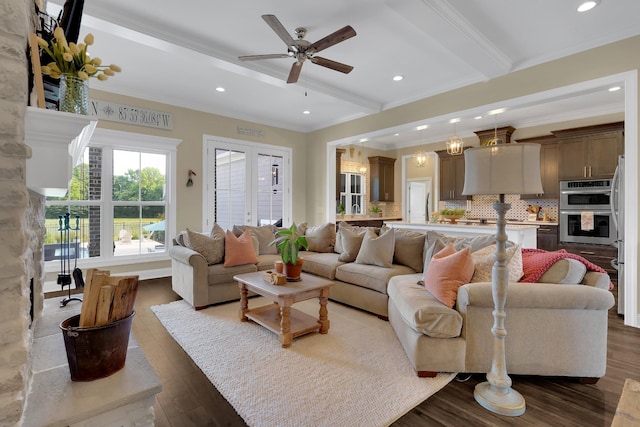 69 Meadows Rd, Hillsboro, TN 37342 - living room featuring crown molding, beam ceiling, wood finished floors, ceiling fan, and recessed lighting