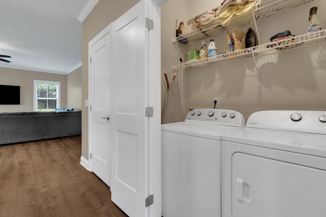 69 Meadows Rd, Hillsboro, TN 37342 - laundry room featuring crown molding, wood finished floors, and washer and dryer