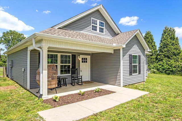 147 Ray Jent Rd, Bethpage, TN 37022 - view of front facade with roof with shingles, a front yard, and a porch