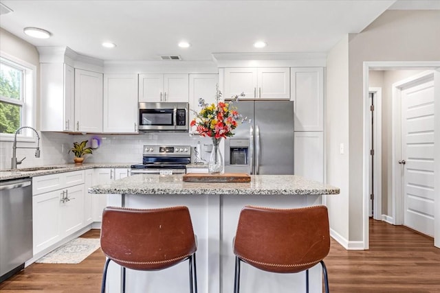 147 Ray Jent Rd, Bethpage, TN 37022 - kitchen with appliances with stainless steel finishes, a sink, white cabinets, and recessed lighting