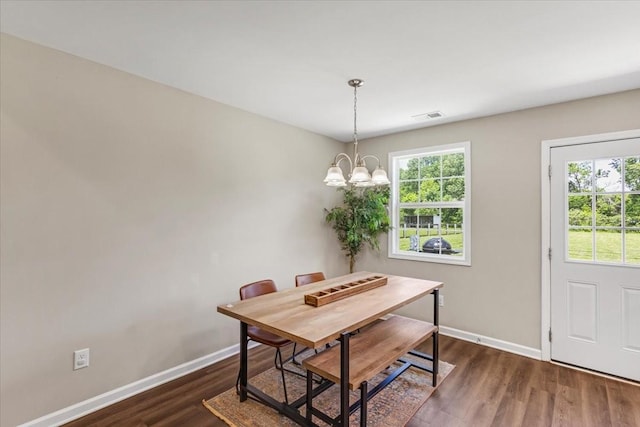 147 Ray Jent Rd, Bethpage, TN 37022 - dining space with baseboards, a chandelier, and dark wood-style flooring