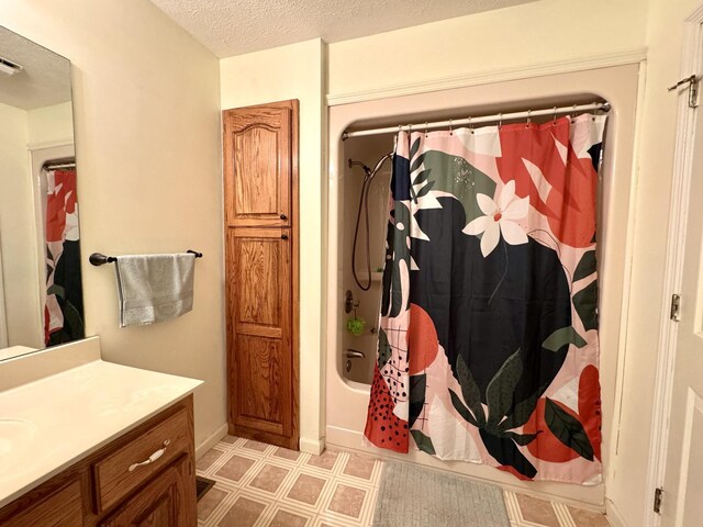 130 Jordan Ln, Hohenwald, TN 38462 - bathroom featuring tile patterned floors, vanity, a textured ceiling, and shower / bathtub combination with curtain
