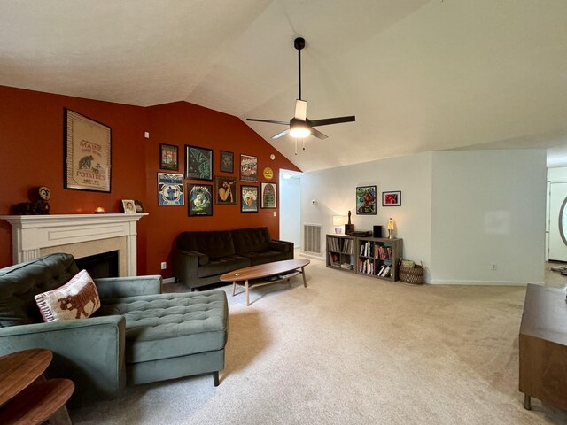 130 Jordan Ln, Hohenwald, TN 38462 - living room with a fireplace, lofted ceiling, ceiling fan, and carpet floors