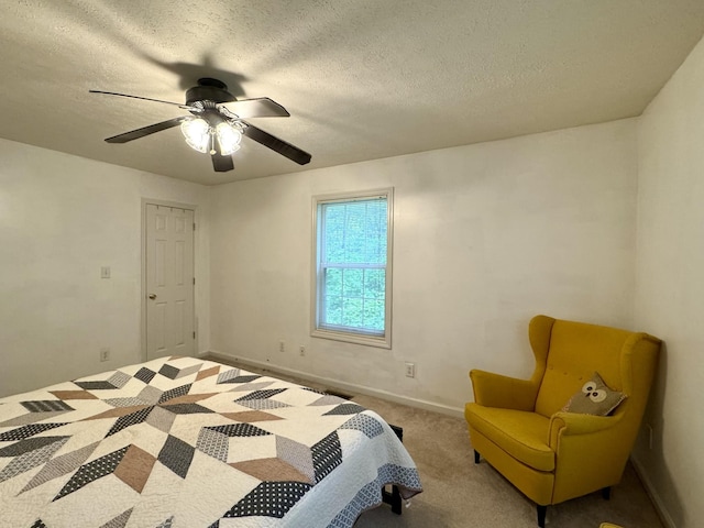 130 Jordan Ln, Hohenwald, TN 38462 - bedroom with a textured ceiling, a ceiling fan, carpet, and baseboards