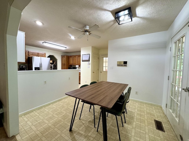 130 Jordan Ln, Hohenwald, TN 38462 - dining space featuring light floors, a ceiling fan, a textured ceiling, baseboards, and recessed lighting