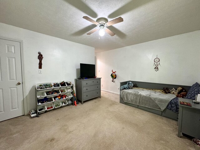 130 Jordan Ln, Hohenwald, TN 38462 - bedroom featuring carpet, a textured ceiling, and ceiling fan