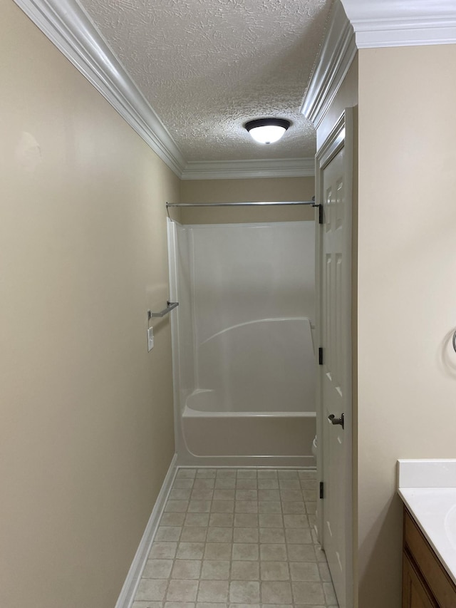 135 Excell Rd Unit 101, Clarksville, TN 37043 - bathroom with vanity, shower / bathtub combination, a textured ceiling, ornamental molding, and baseboards