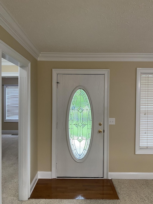 135 Excell Rd Unit 101, Clarksville, TN 37043 - foyer entrance with baseboards, crown molding, and a textured ceiling