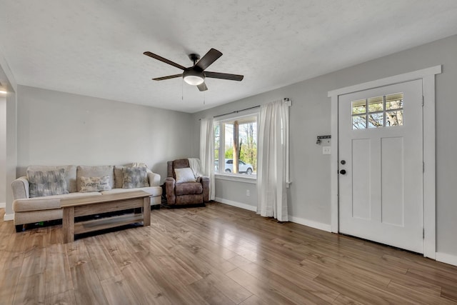 10 Patrick Rd, Fayetteville, TN 37334 - foyer featuring healthy amount of natural light, baseboards, ceiling fan, wood finished floors, and a textured ceiling