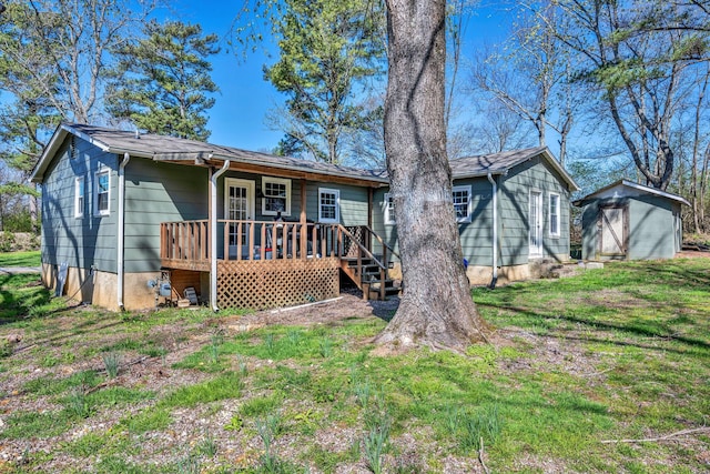 10 Patrick Rd, Fayetteville, TN 37334 - view of front of property featuring a storage unit, an outbuilding, and a wooden deck