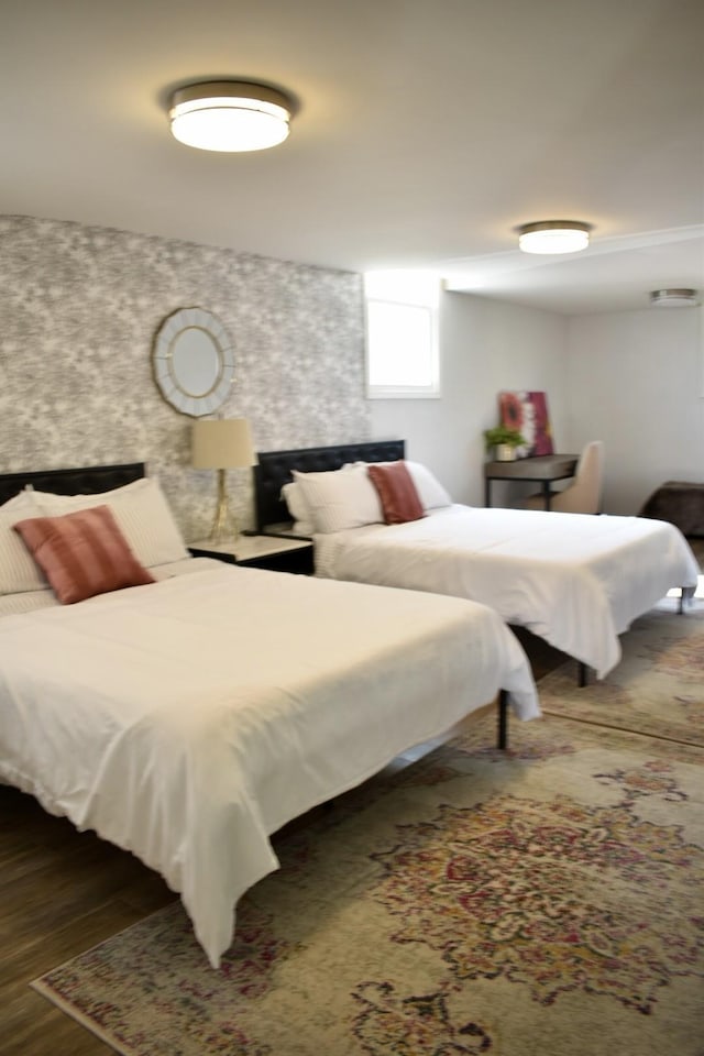 bedroom with wood finished floors