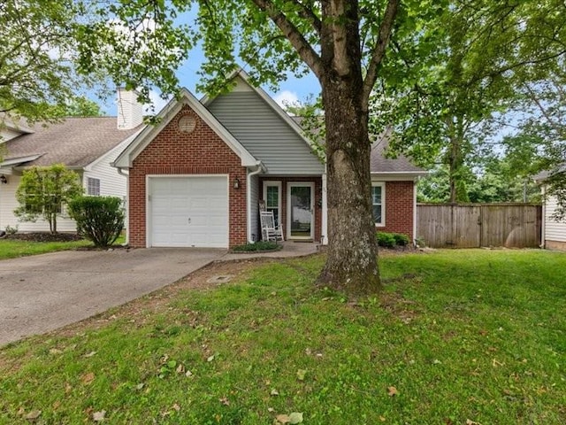 view of front of property with brick siding, a garage, driveway, and a chimney