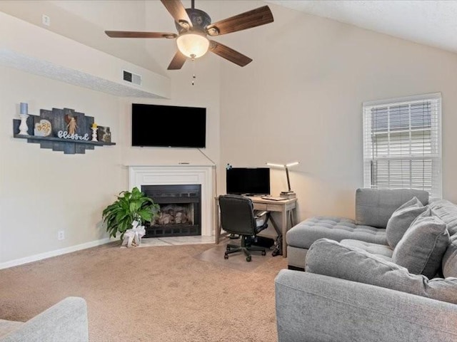 living room featuring carpet, a fireplace with flush hearth, a ceiling fan, baseboards, and high vaulted ceiling