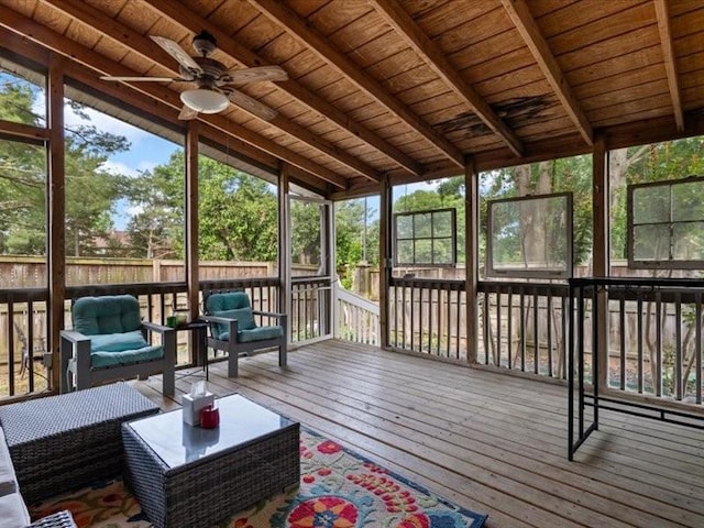 sunroom / solarium with ceiling fan, outdoor lounge area, and healthy amount of natural light