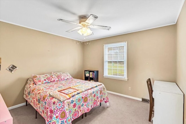505 Kindel Dr, Decherd, TN 37324 - bedroom with carpet, baseboards, ornamental molding, and a ceiling fan
