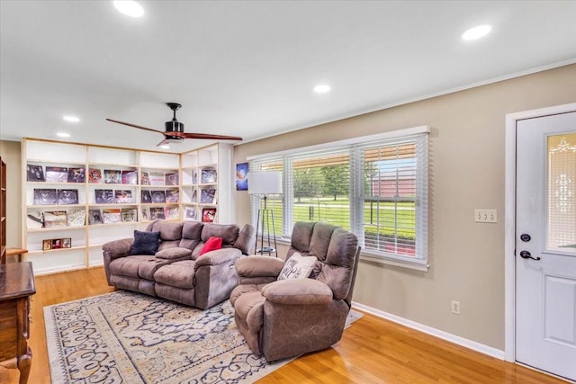 505 Kindel Dr, Decherd, TN 37324 - living room featuring wood finished floors, recessed lighting, ceiling fan, baseboards, and ornamental molding