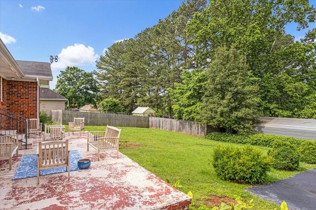 505 Kindel Dr, Decherd, TN 37324 - view of yard featuring a patio