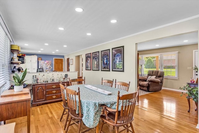 505 Kindel Dr, Decherd, TN 37324 - dining space featuring light wood-style flooring, crown molding, and recessed lighting