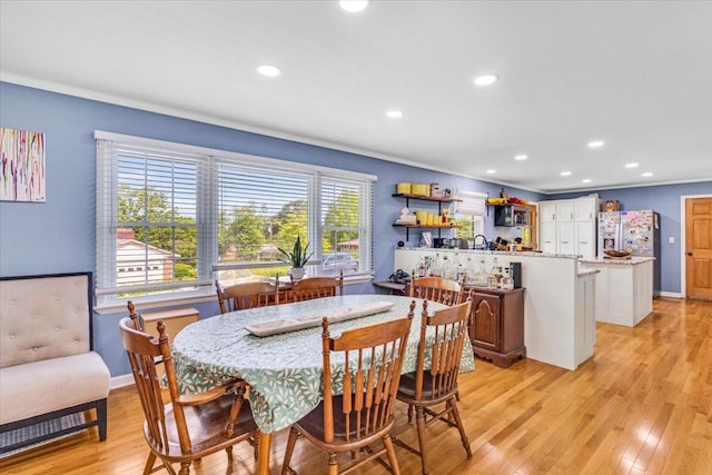 505 Kindel Dr, Decherd, TN 37324 - dining area featuring light wood-style flooring, recessed lighting, baseboards, and ornamental molding
