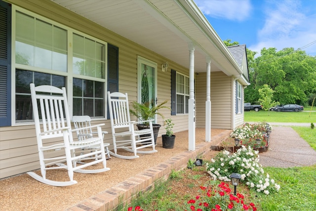 doorway to property featuring a porch