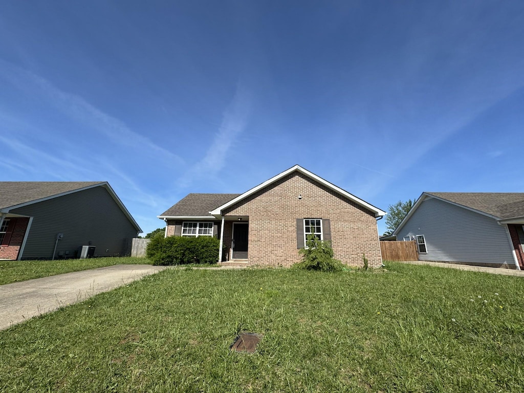 ranch-style house with brick siding