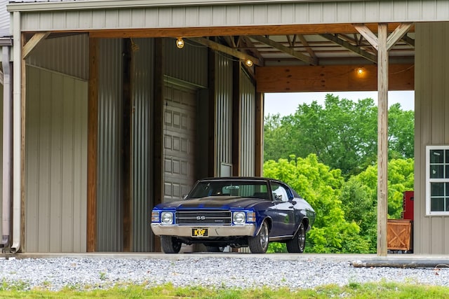 291 Bowling Branch Rd, Cottontown, TN 37048 - view of parking / parking lot with a garage