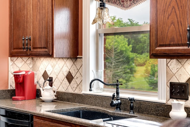 291 Bowling Branch Rd, Cottontown, TN 37048 - kitchen featuring a sink and tasteful backsplash