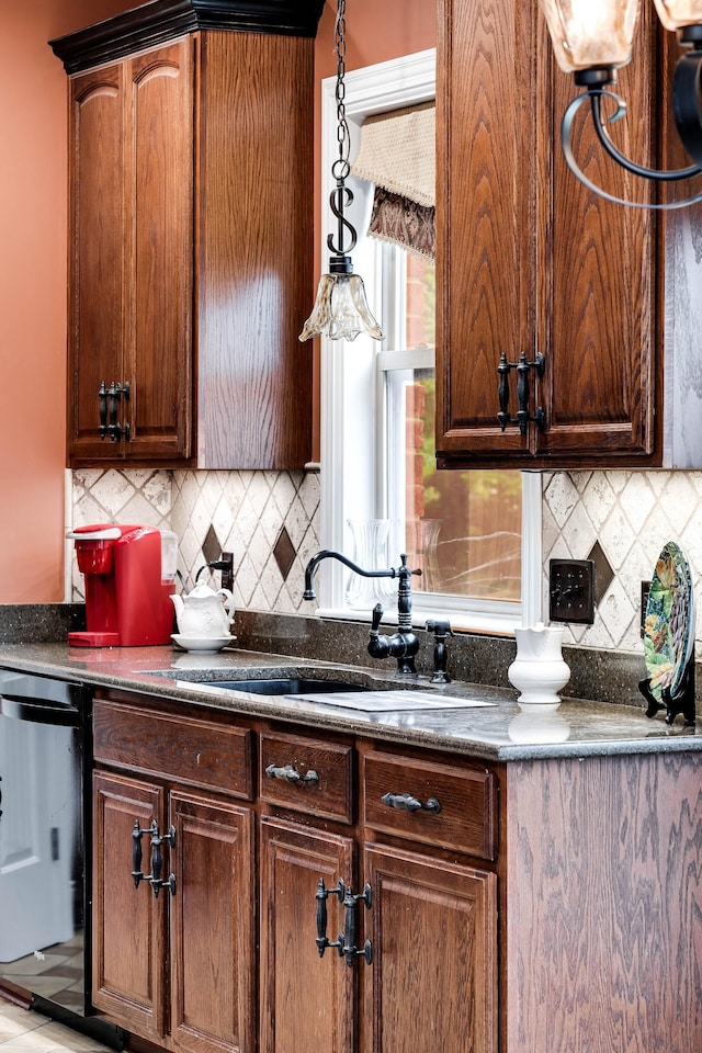 291 Bowling Branch Rd, Cottontown, TN 37048 - kitchen with a sink, dark countertops, and decorative backsplash