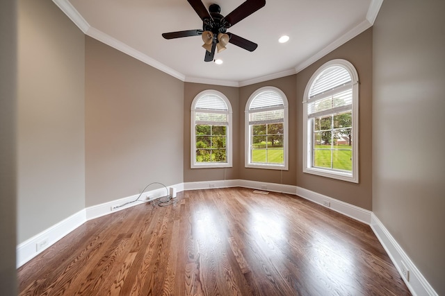 291 Bowling Branch Rd, Cottontown, TN 37048 - spare room with crown molding, wood finished floors, healthy amount of natural light, a ceiling fan, and baseboards