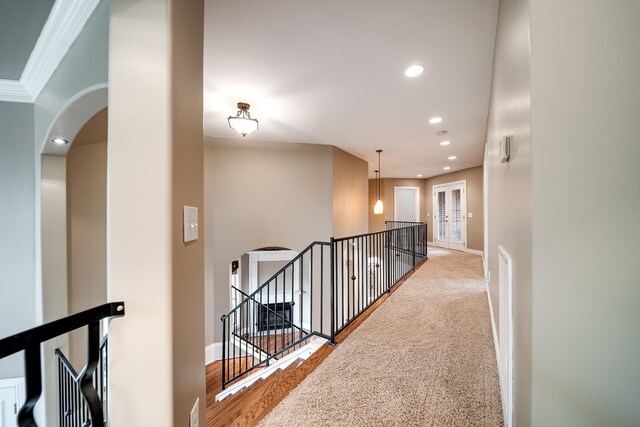 291 Bowling Branch Rd, Cottontown, TN 37048 - hallway with arched walkways, an upstairs landing, recessed lighting, and baseboards