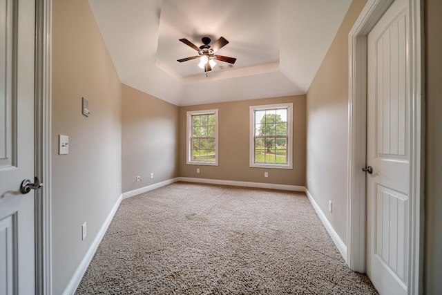 291 Bowling Branch Rd, Cottontown, TN 37048 - unfurnished room featuring light carpet, a tray ceiling, a ceiling fan, and baseboards