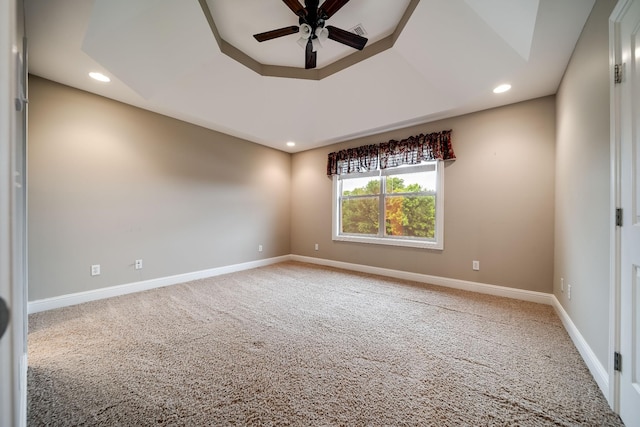 291 Bowling Branch Rd, Cottontown, TN 37048 - unfurnished room featuring a ceiling fan, carpet, a tray ceiling, recessed lighting, and baseboards
