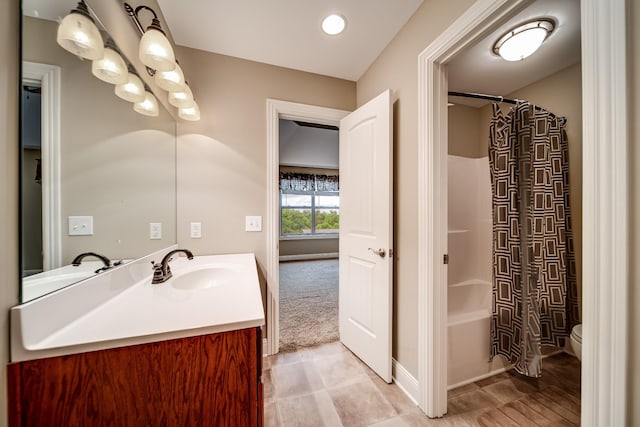291 Bowling Branch Rd, Cottontown, TN 37048 - full bathroom with vanity, toilet, shower / bath combo, and baseboards